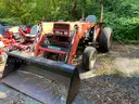 Case International 385 Tractor w/ Bush 2346 QT Bucket