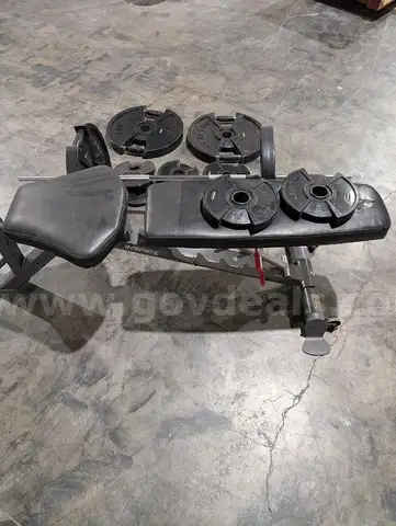 Bench with bar and weights