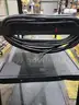 Black steel multipurpose cart with swivel wheels