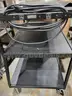 Black steel multipurpose cart with swivel wheels