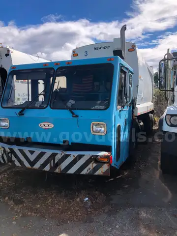 2008 Crane Carrier with New Way Sanitation Truck