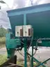 Bagging plant used for bagging mulch with hot strip sealer.