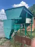 Bagging plant used for bagging mulch with hot strip sealer.