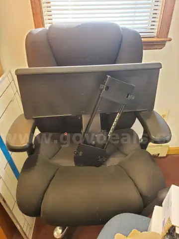 used chair and computer mount for under desk all works. no rips in chair and works fine nice chair