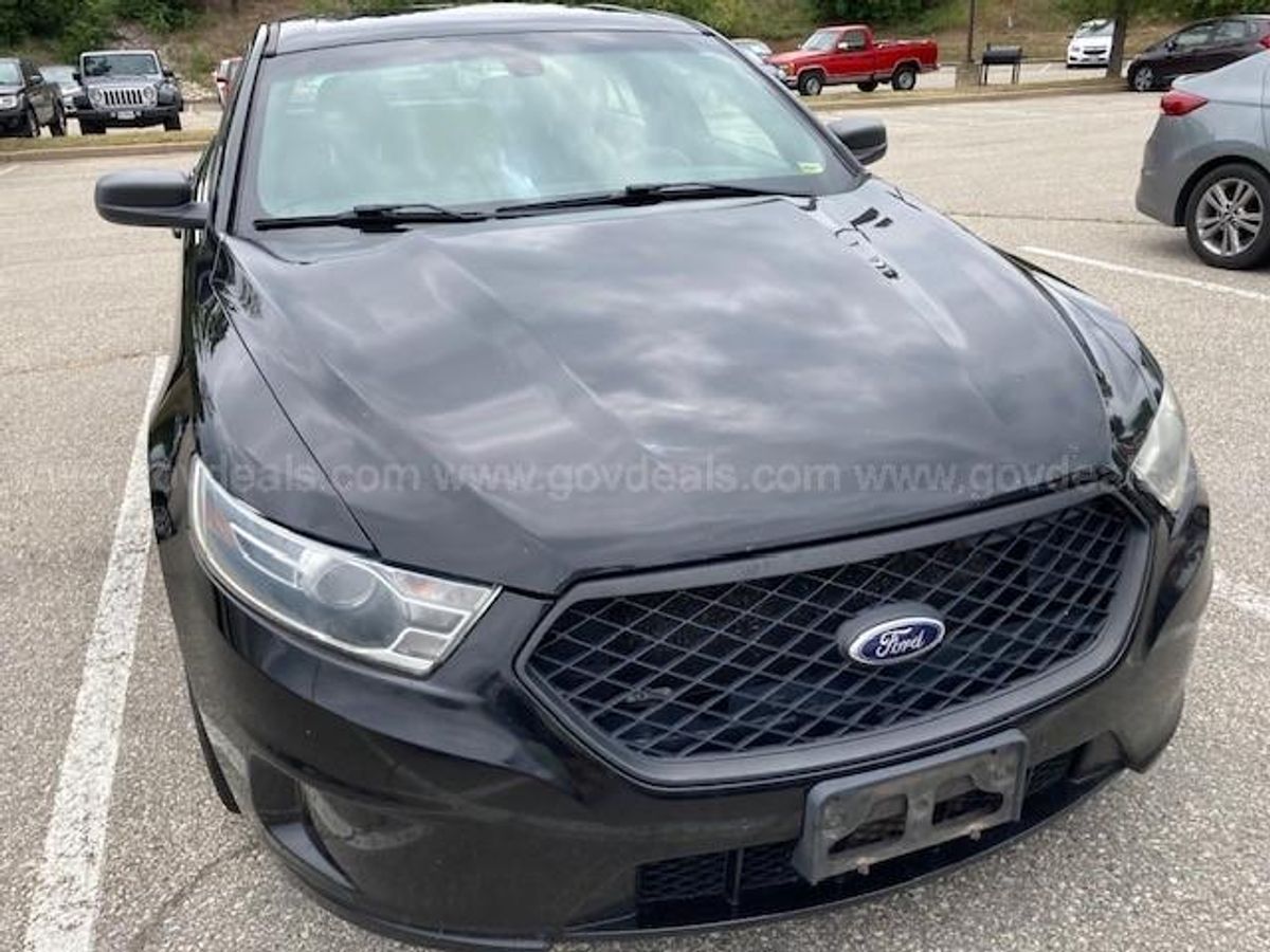 2014 Ford Taurus Mileage: 155,193. | AllSurplus