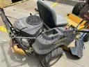 Lot of a Raptor Hustler Zero Turn Lawn Mower.
