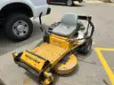 Lot of a Raptor Hustler Zero Turn Lawn Mower.