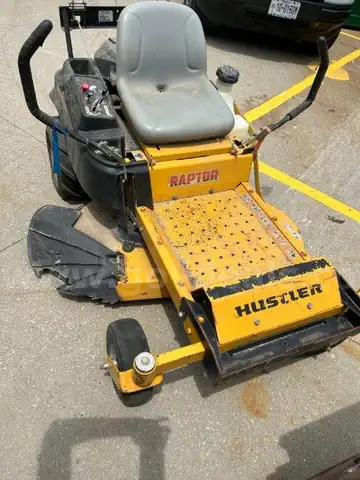 Lot of a Raptor Hustler Zero Turn Lawn Mower.