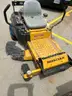 Lot of a Raptor Hustler Zero Turn Lawn Mower.