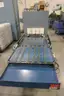 Shaklin S-40 Shrink Wrap Machine with Conveyor.