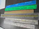 Lot of 3 Power Strips, Rolling Cart and 11 Various Rulers.