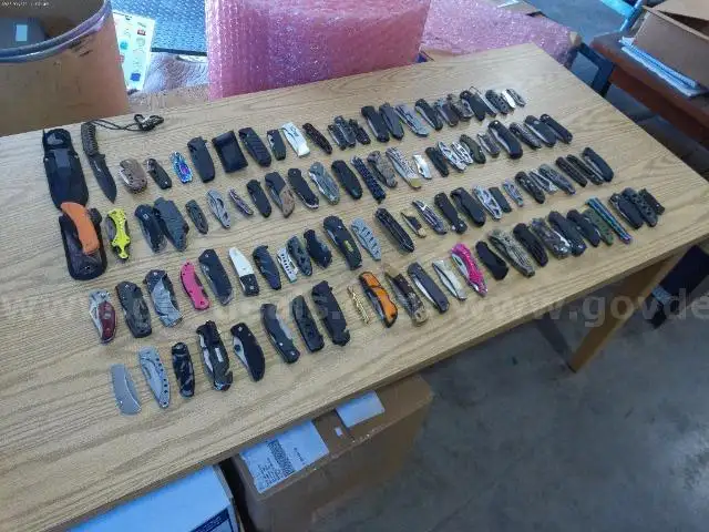 Lot of Approximately 100 Single Blade Knives.