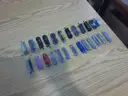 Lot of 12 Small Gerber and 13 Small Leatherman Multi-Tools.