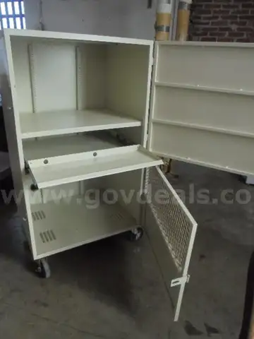 Lot of (1) Metal Computer Cabinet on Wheels.
