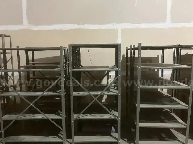 Lot of (14) Metal Shelving in Various Sizes and Styles.