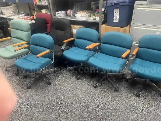 Lot of (7) Rolling Chairs.