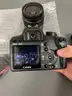 Canon EOS Rebel XS 10.1MP DSLR Camera with Accessories.