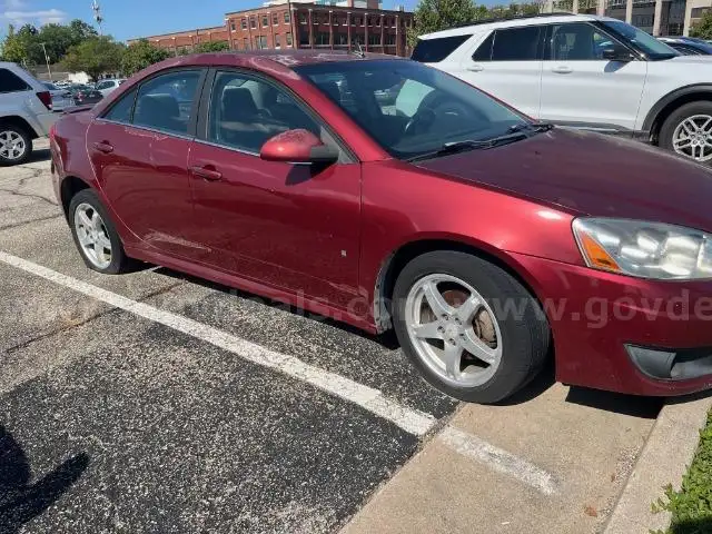 2009 Pontiac G6, 120000 Miles.