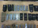 Lot of 36 Leatherman and 20 Gerber Multi-tools.