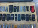Lot of 36 Leatherman and 20 Gerber Multi-tools.