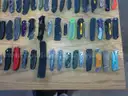 Lot of 100 Single Blade Knives.