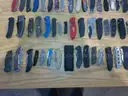 Lot of 100 Single Blade Knives.