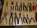 Lot of 44 Various Linesman Pliers and Metal Cutting Tools.