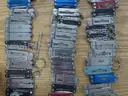 Lot of 100 Small Leatherman Multi-tools.