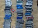 Lot of 100 Small Leatherman Multi-tools.