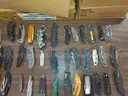 Lot of 100 Single Blade Knives.