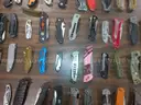 Lot of 100 Single Blade Knives.