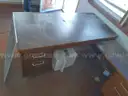 Lot of a Portable Office Building, Misc. Office Furniture, and an AC Unit.