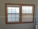 Lot of a Portable Office Building, Misc. Office Furniture, and an AC Unit.