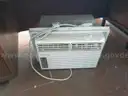 Lot of a Portable Office Building, Misc. Office Furniture, and an AC Unit.