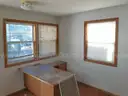 Lot of a Portable Office Building, Misc. Office Furniture, and an AC Unit.