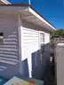 Lot of a Portable Office Building, Misc. Office Furniture, and an AC Unit.