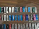 Lot of (100) Small Leatherman Multi-tools.
