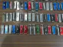 Lot of (100) Small Leatherman Multi-tools.