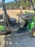 John Deere Gator, 911.4 hours.