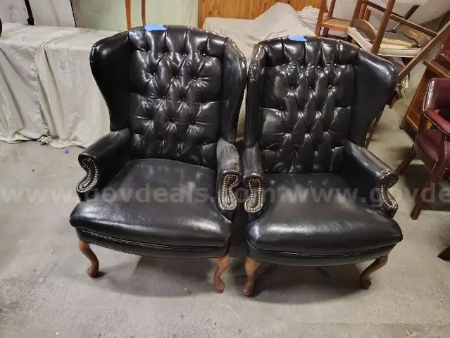 Lot of (2) Black Wingback Chairs.