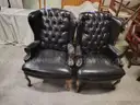 Lot of (2) Black Wingback Chairs.