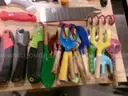 Lot of Shovels, Tent Stakes, and Various Hand Tools.