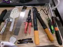 Lot of Shovels, Tent Stakes, and Various Hand Tools.