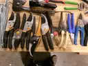 Lot of Shovels, Tent Stakes, and Various Hand Tools.