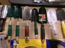 Lot of Shovels, Tent Stakes, and Various Hand Tools.