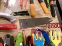 Lot of Shovels, Tent Stakes, and Various Hand Tools.