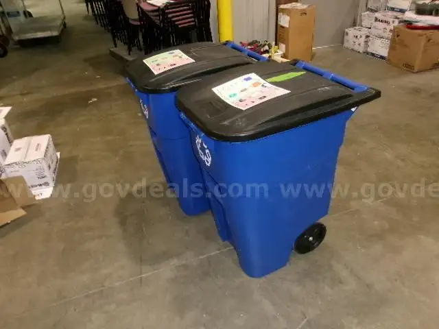Lot of (9) Rubbermaid Rolling Recycle Cans w/Lids, 50 Gal Capacity.