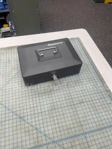 Lot of (1) Small Sentry Safe with Keys.