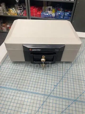 Lot of (1) Small Sentry Safe with Keys.