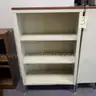 Lot of (1) Metal Bookcase and (1) Wood Bookcase.